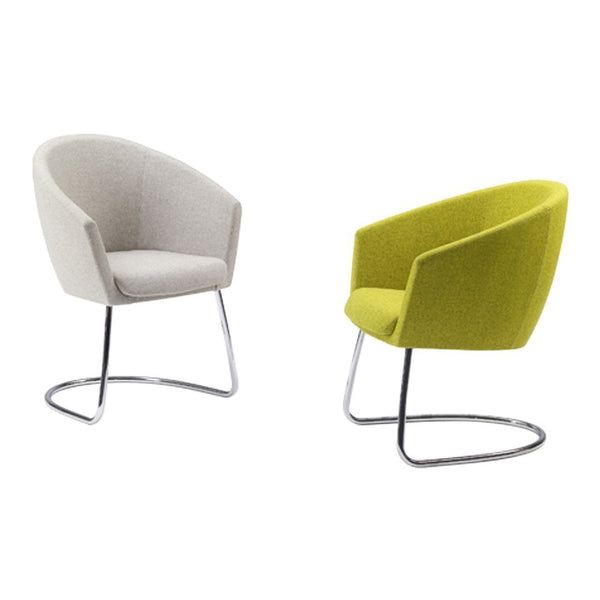 Two modern accent chairs featuring soft gray and vibrant lime green upholstery with sleek chrome bases.