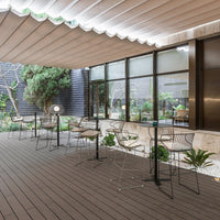"Modern outdoor space featuring textured wooden flooring, sleek black frames, and greenery accents."