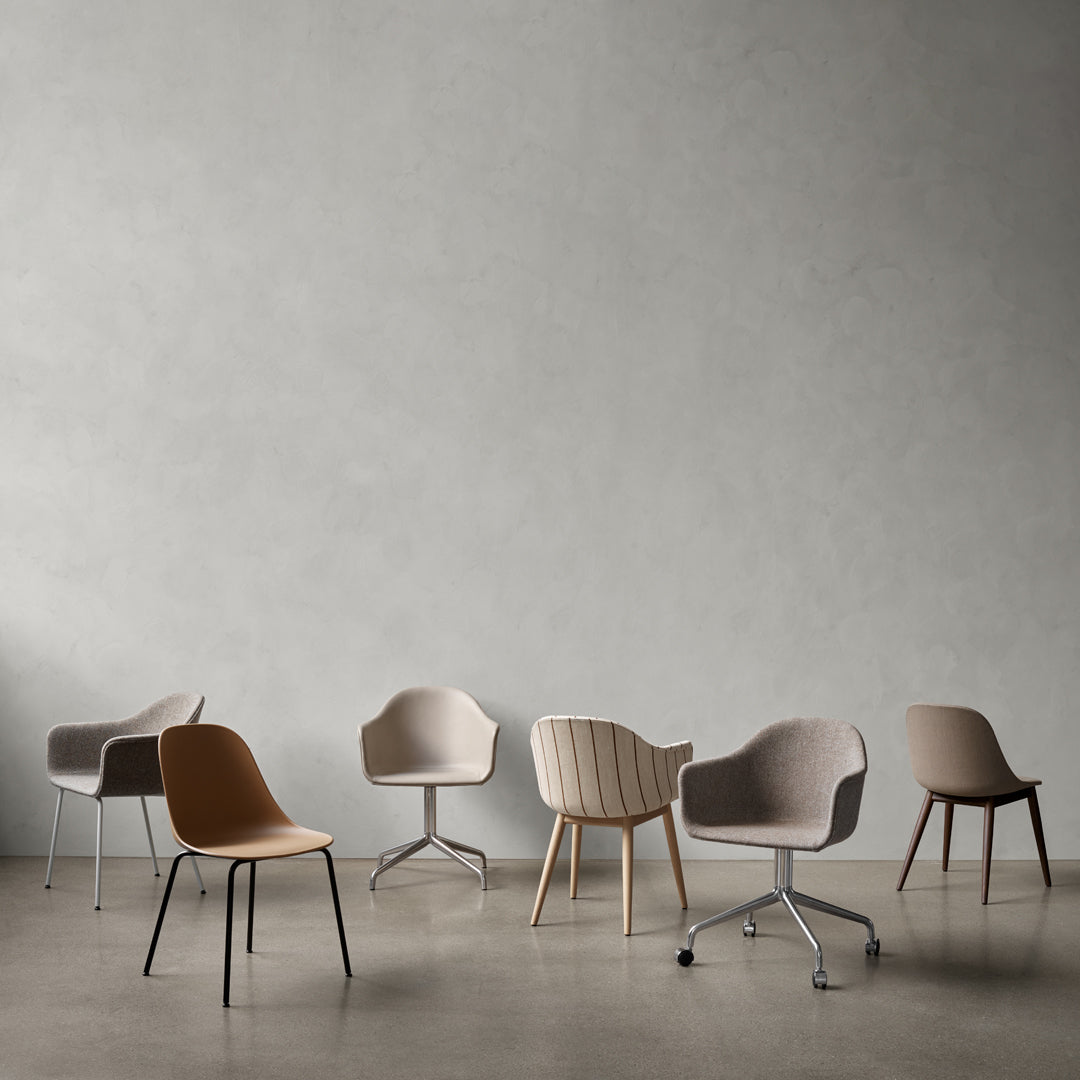 Set of modern chairs in neutral tones: brown, beige, gray, featuring varied textures and patterns on upholstery.