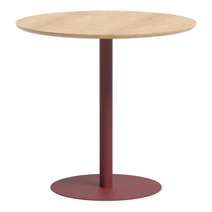 Round wood tabletop with a natural finish and a deep red metal base, featuring a smooth, modern design.