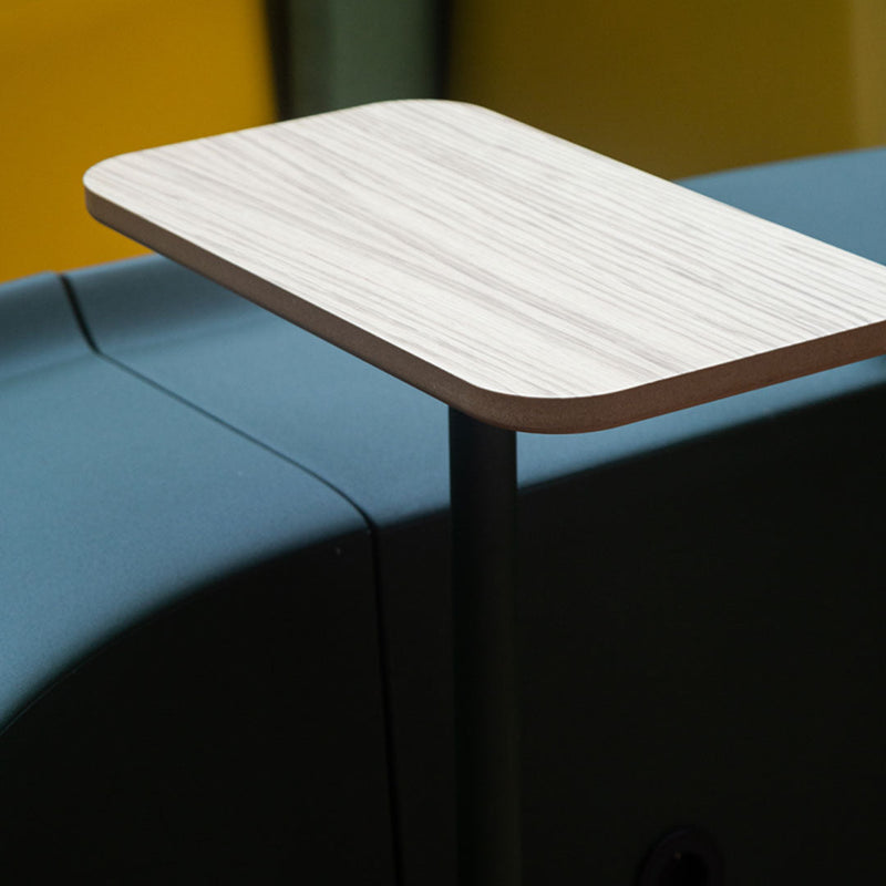 Light wood tabletop with a smooth finish, complemented by sleek teal and yellow patterns.