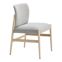 Light gray upholstered chair with a textured fabric and natural wood legs, offering a modern and minimalist design.