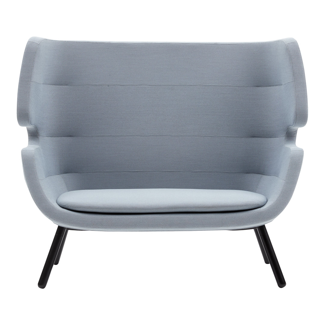 Light gray upholstered sofa with smooth, curved lines and a modern design, featuring subtle ribbed patterns.