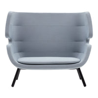 Light gray upholstered sofa with smooth, curved lines and a modern design, featuring subtle ribbed patterns.