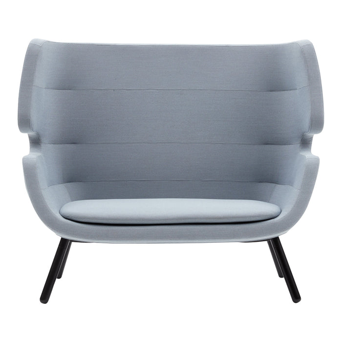 Light gray upholstered sofa with smooth, curved lines and a modern design, featuring subtle ribbed patterns.