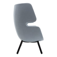 Gray upholstered chair with a unique shape and black wooden legs, featuring a smooth, subtle texture.