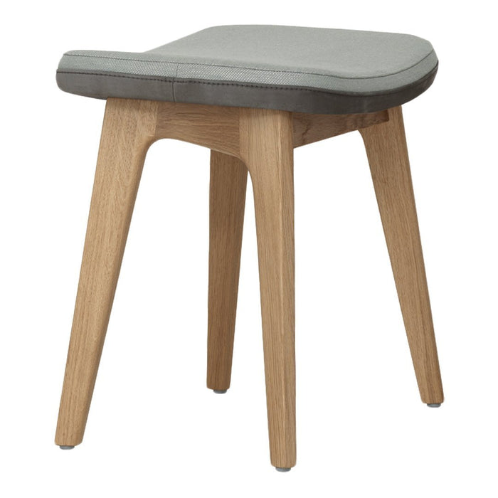 Gray cushioned stool with natural wood legs, featuring a modern minimalist design. Perfect for any decor style.