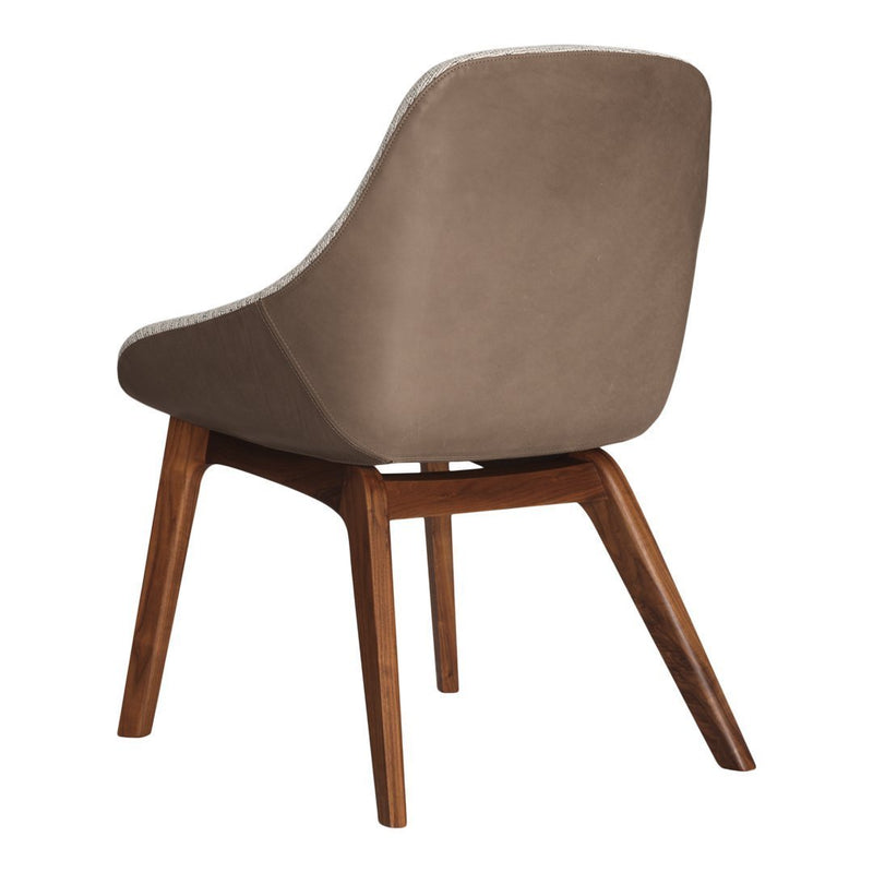Light beige chair with smooth upholstery and wooden legs, featuring a minimalist design and contemporary appearance.