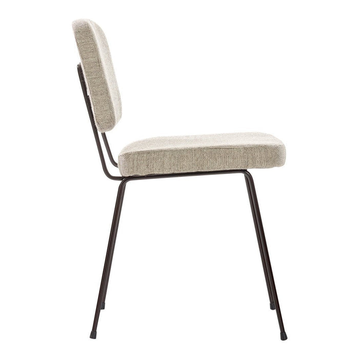 Side view of a beige upholstered chair with a textured fabric seat and black metal legs. Elegant and modern design.