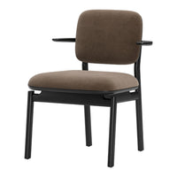 Brown suede chair with a sleek black wooden frame, combining modern design and minimalist style.