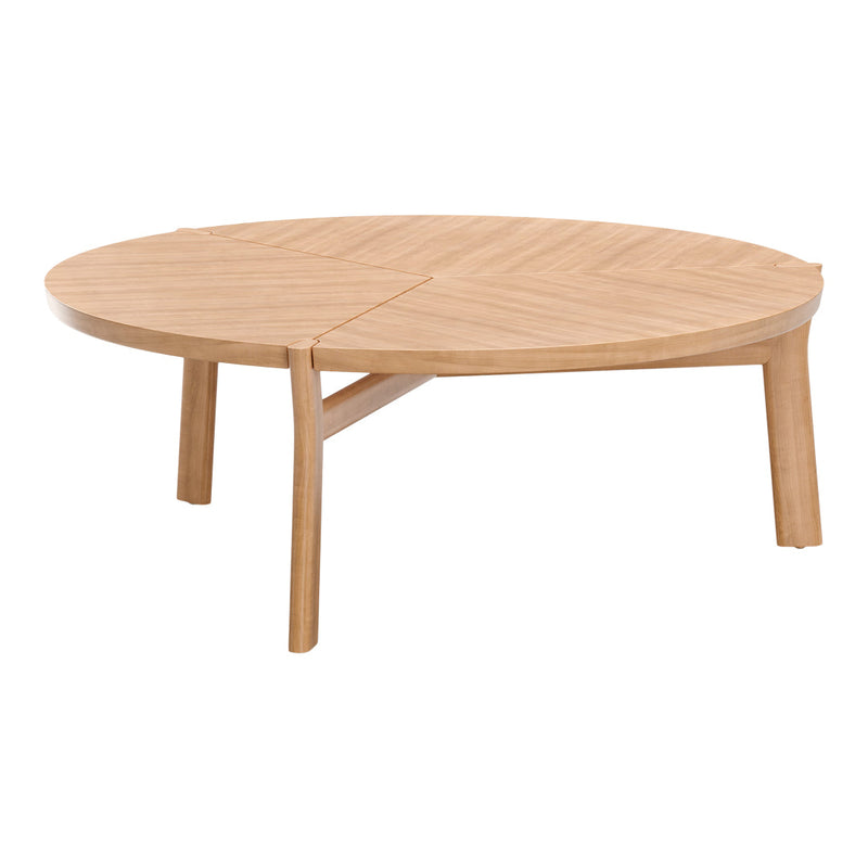 Round wooden coffee table with a natural light tan finish and unique sunburst pattern on the tabletop.