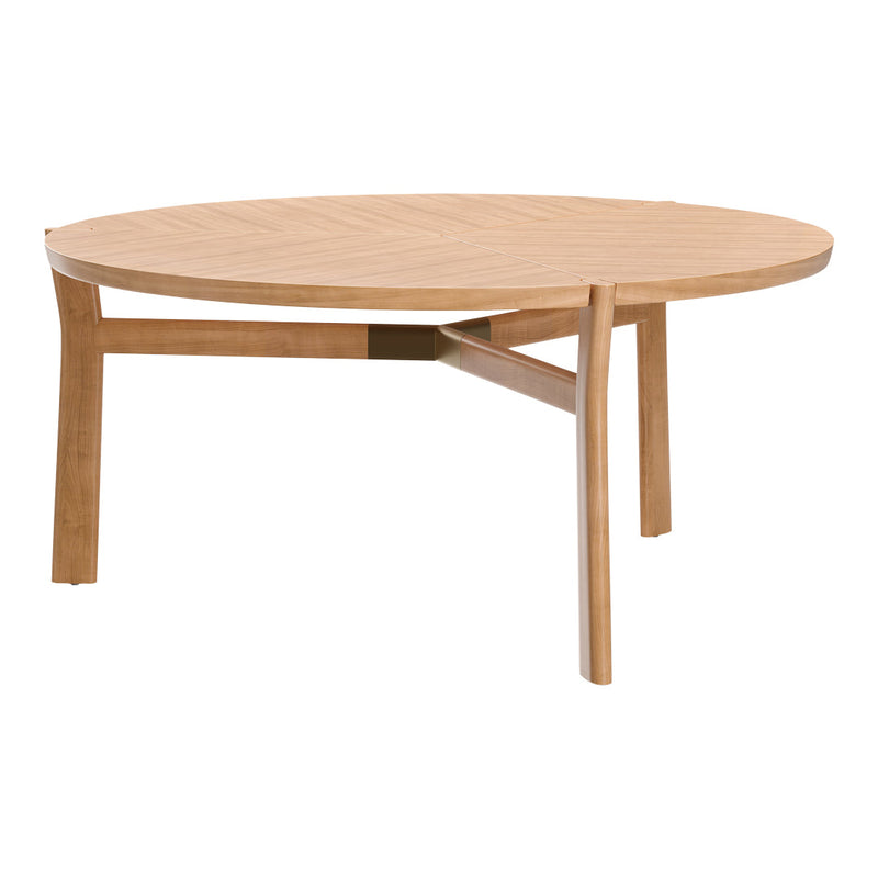 Round wooden table with a natural light wood finish and geometric patterned surface.