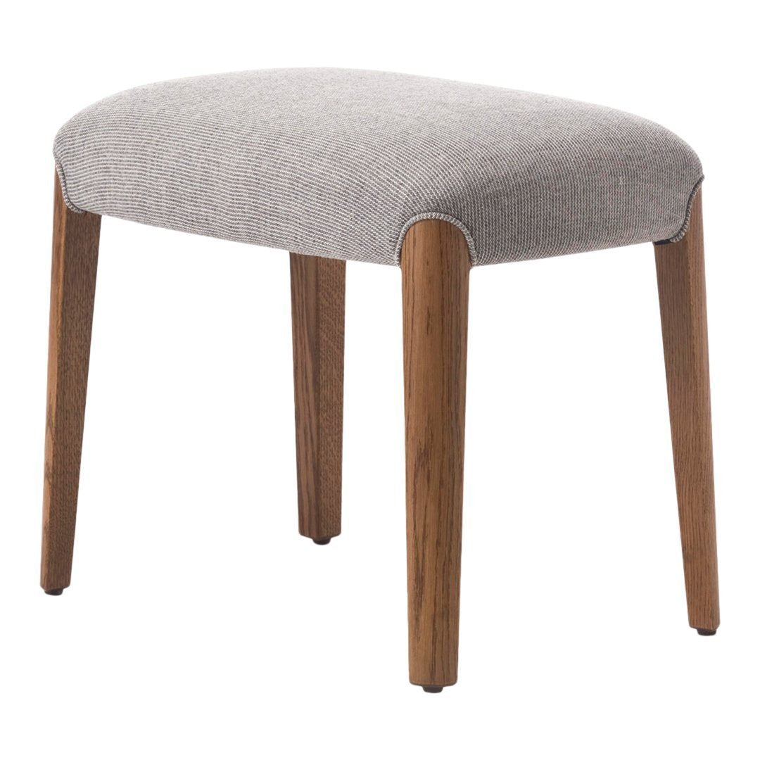 Gray upholstered stool with wooden legs, featuring a simple, modern design. Ideal for contemporary decor.