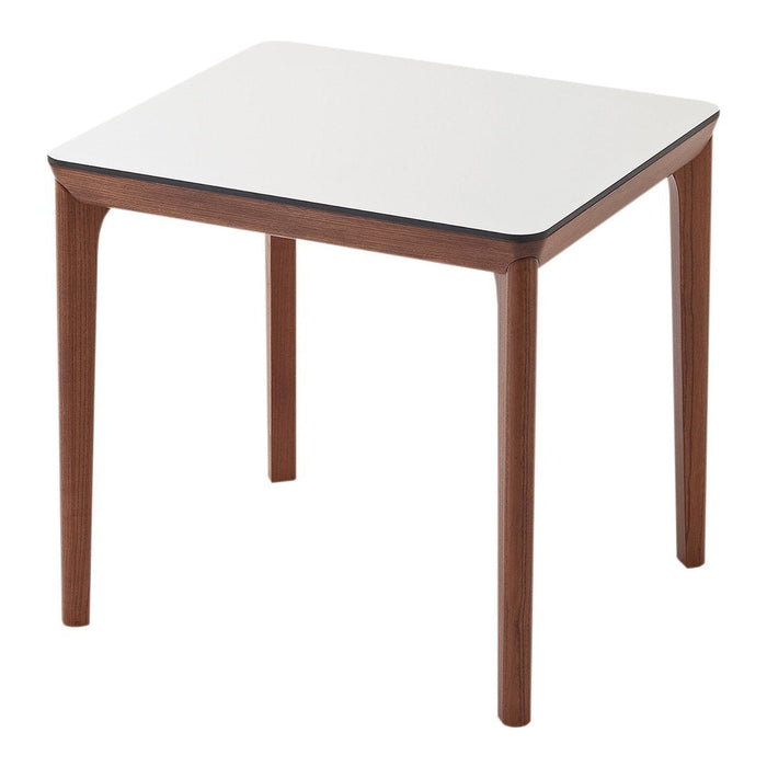 White tabletop with walnut wooden legs, featuring a sleek, minimalist design. Perfect for modern decor.