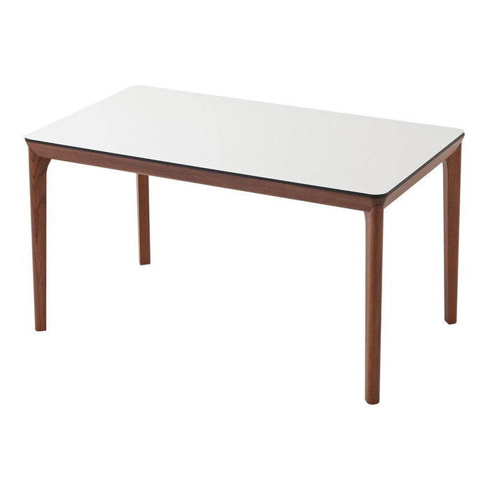White tabletop with walnut wood legs, featuring a sleek, modern design. Perfect for contemporary dining spaces.