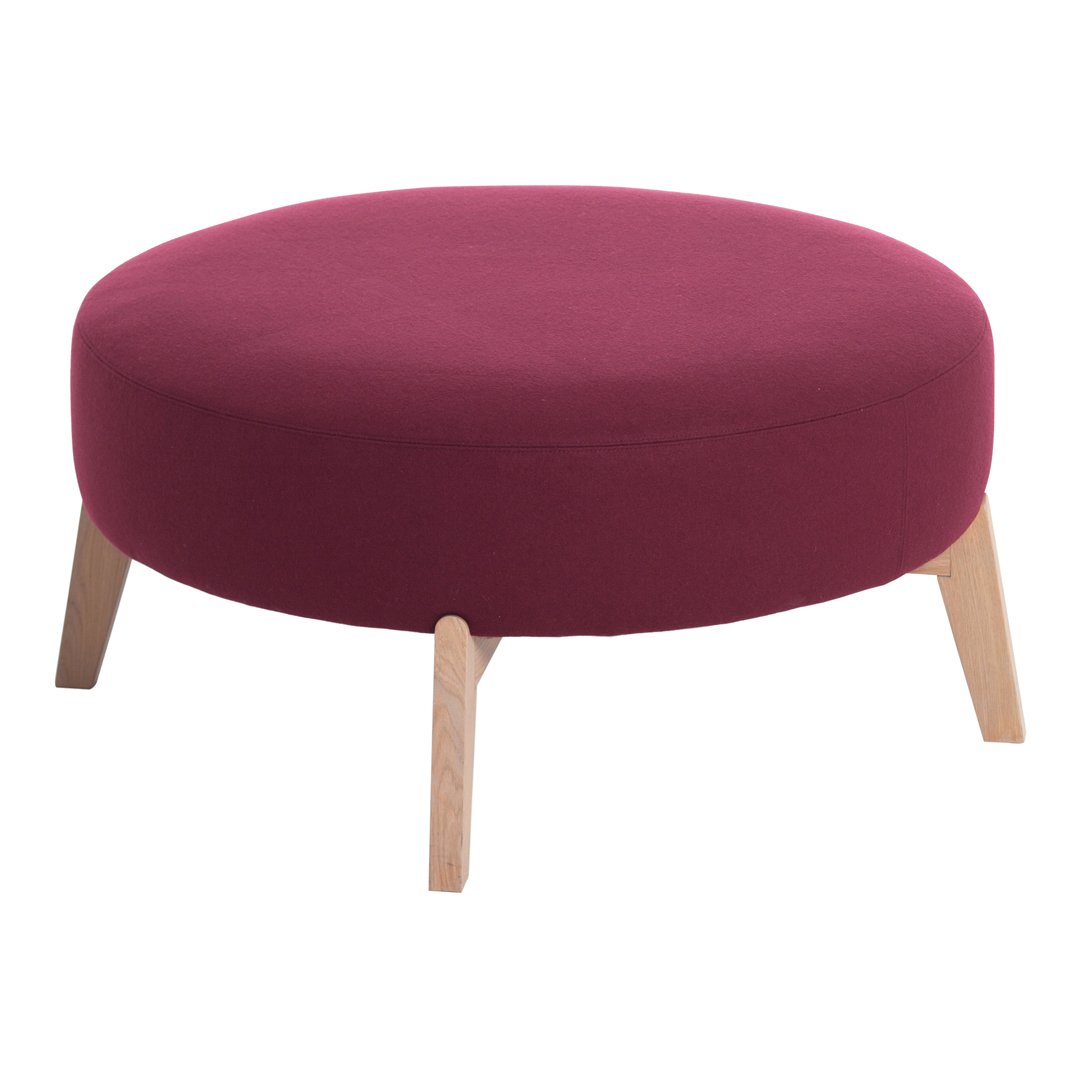 Round burgundy ottoman with wooden legs, featuring a smooth, solid color design perfect for modern decor.