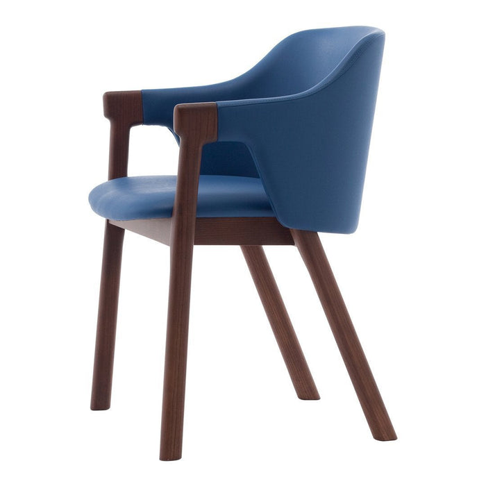 Blue upholstered chair with wooden legs, featuring a sleek, modern design and smooth, minimalist lines.