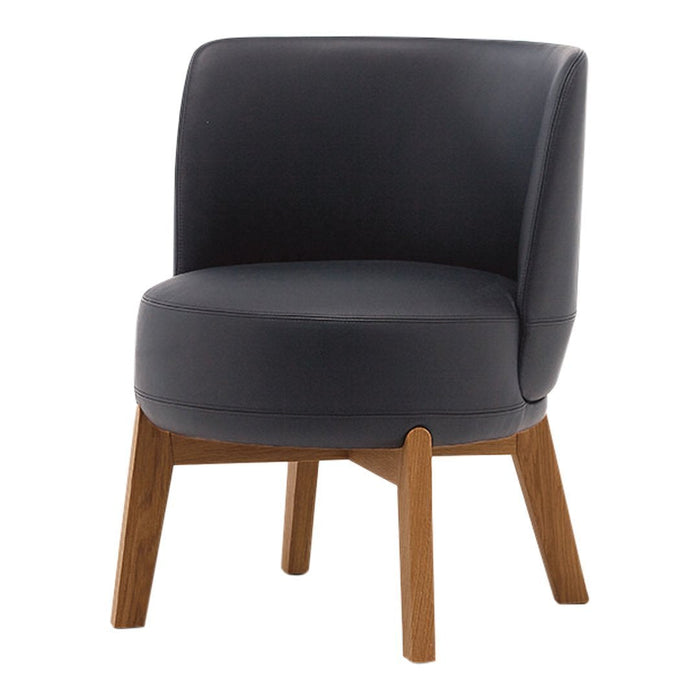 Sleek black upholstered chair with smooth curves and natural wood legs, perfect for modern decor.