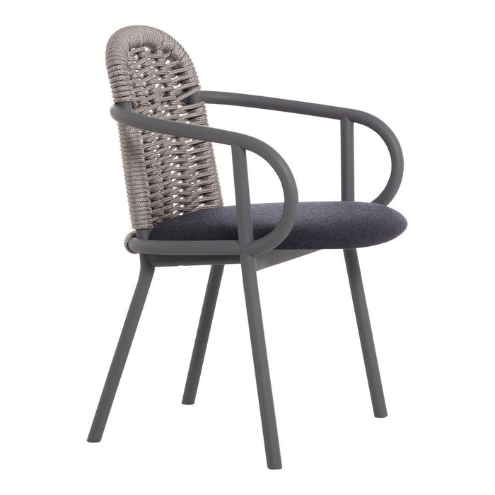 Modern gray chair with woven backrest and dark blue cushion, featuring a sleek design and minimalistic patterns.
