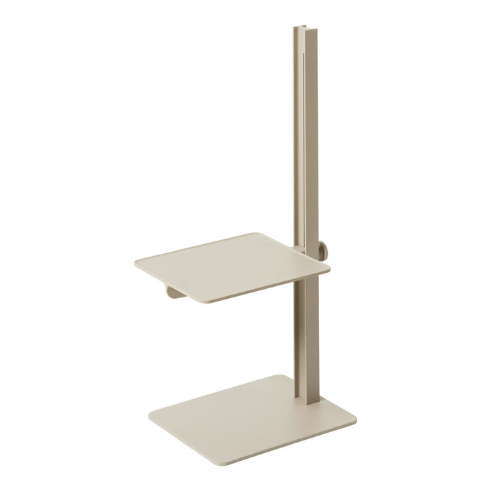 Beige metal shelf with simple geometric design and smooth surfaces, perfect for modern decor.