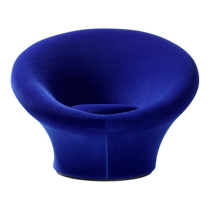 Vibrant royal blue velvet armchair with a modern, smooth, and rounded design. Perfect for stylish decor.