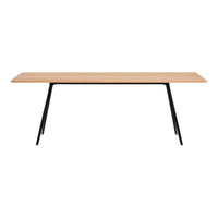 Light oak table top with a smooth finish, accented by sleek black metal legs. Modern and minimalist design.