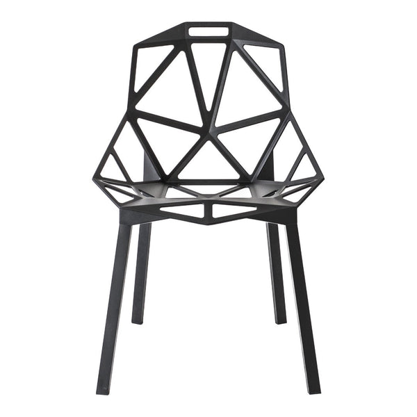 Black geometric chair with a modern cut-out pattern and sleek, minimalist design. Perfect for contemporary spaces.