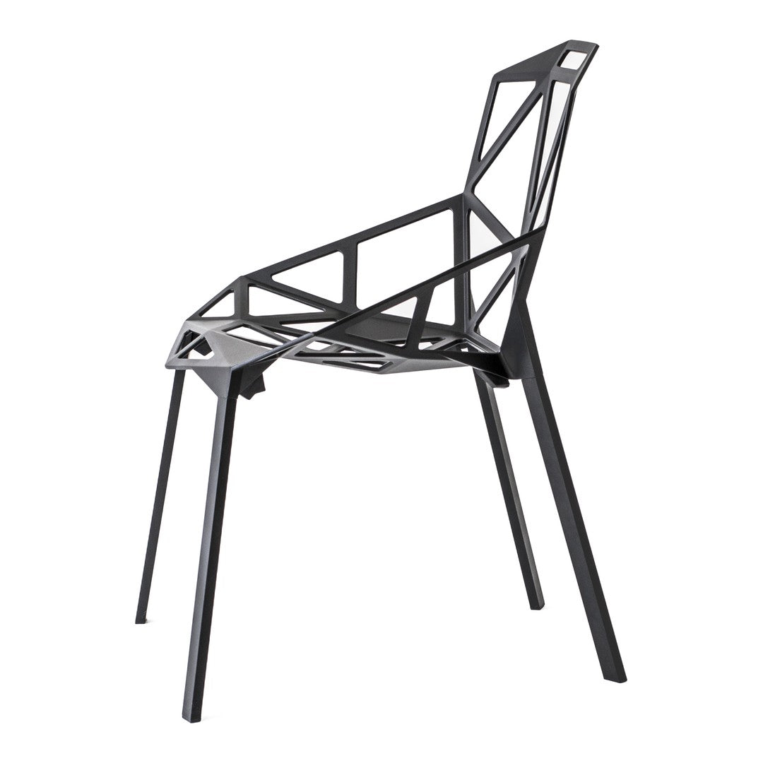 Stylish black chair featuring a geometric, open pattern for a modern, contemporary look. Ideal for minimalist spaces.