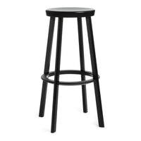 Black wooden bar stool with a smooth, round seat and slender legs, featuring a simple, modern design.