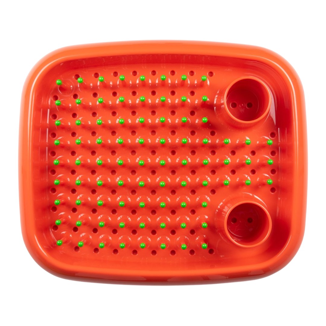 Bright orange tray with green dot patterns and two circular openings for drainage. Perfect for vibrant kitchen use.
