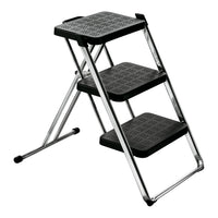 Black three-step ladder with perforated non-slip surfaces and shiny chrome frame. Perfect for added stability and style.