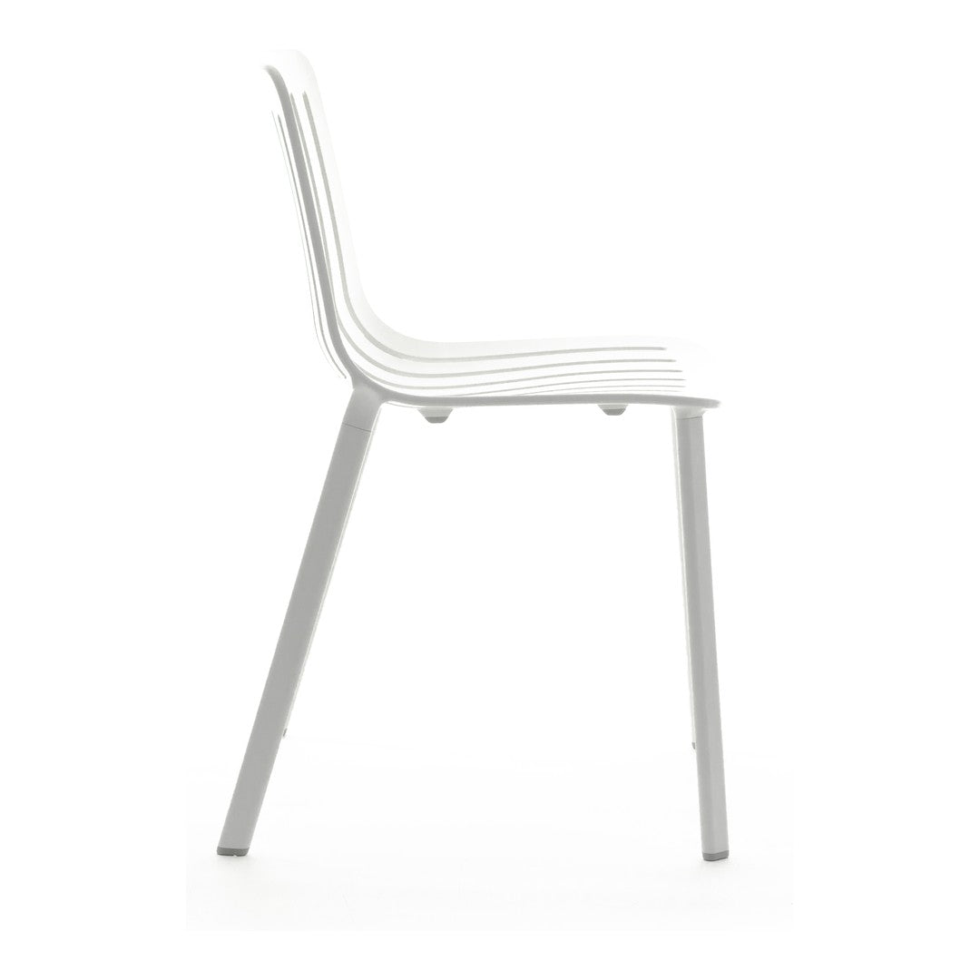 White modern chair with sleek lines and a minimalist design, featuring a glossy finish and subtle texture.