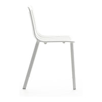 White modern chair with sleek lines and a minimalist design, featuring a glossy finish and subtle texture.