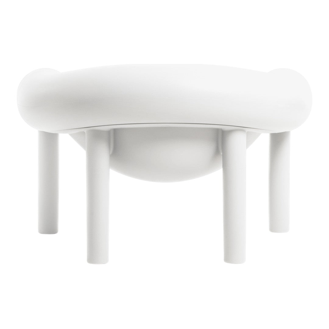White minimalist stool with a smooth, rounded top and sleek, cylindrical legs in a clean, modern design.