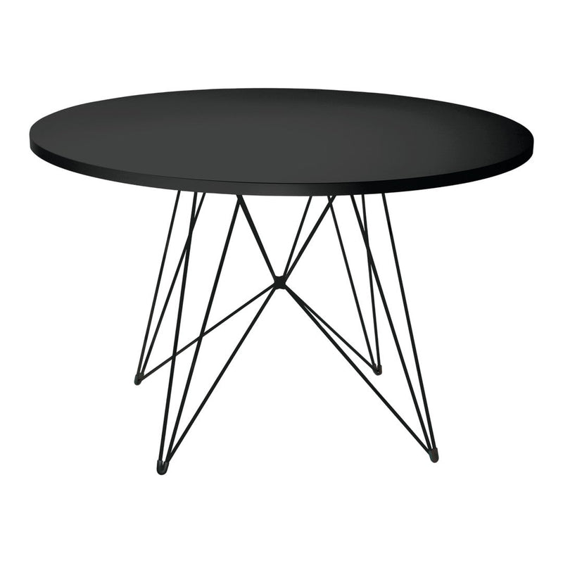 Round black table with a sleek matte surface and geometric black metal legs, adding a modern touch to any space.