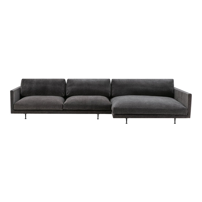 Modern gray sectional sofa with smooth velvet texture and sleek metal legs, featuring a minimalist design.