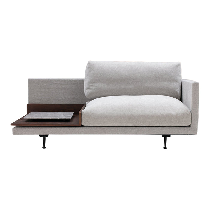 Stylish gray sofa with modern lines and contrasting dark wood accent table. Sleek and minimalist design.