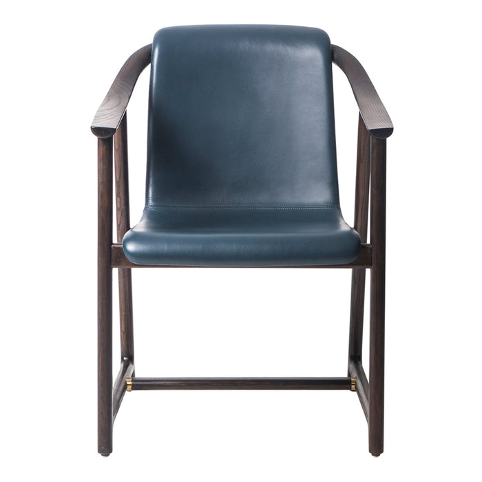 Modern armchair featuring a dark teal seat and rich walnut wood frame, showcasing a sleek, minimalist design.