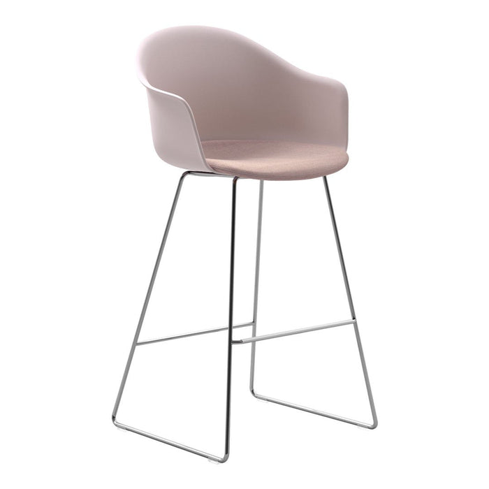 Light pink upholstered bar stool with a sleek chrome frame, featuring a smooth, minimalist design.