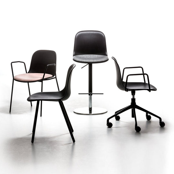 "Collection of sleek black and pink chairs in modern designs, featuring various styles and silhouettes against a light background."