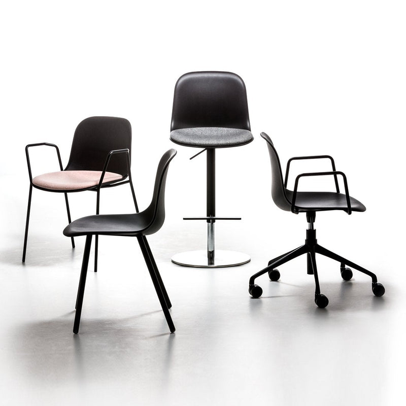 "Collection of sleek black and pink chairs in modern designs, featuring various styles and silhouettes against a light background."