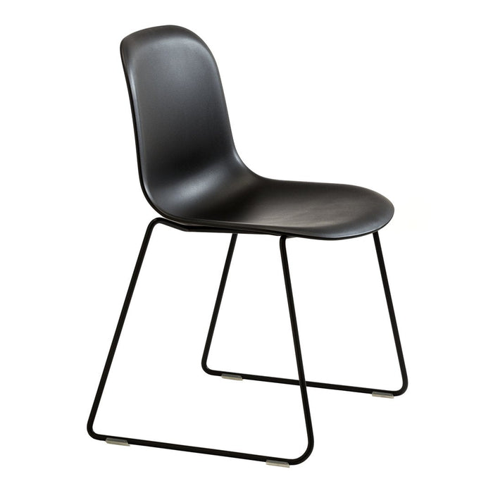 Sleek black chair with smooth finish and minimalist design, featuring a modern metal base. Ideal for contemporary decor.