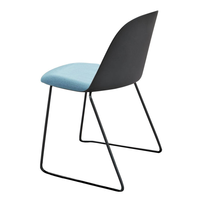 Modern chair with a sleek black frame, featuring a soft blue upholstered seat. Minimalistic design with clean lines.