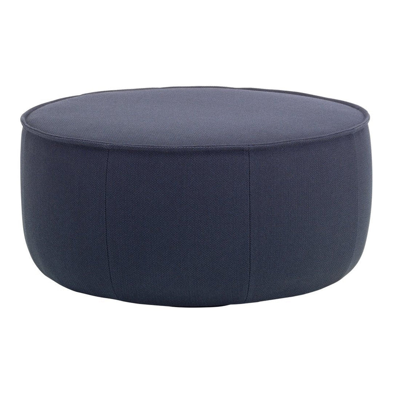 Round navy blue ottoman with a smooth, solid fabric texture and minimal stitching detail. Ideal for modern decor.