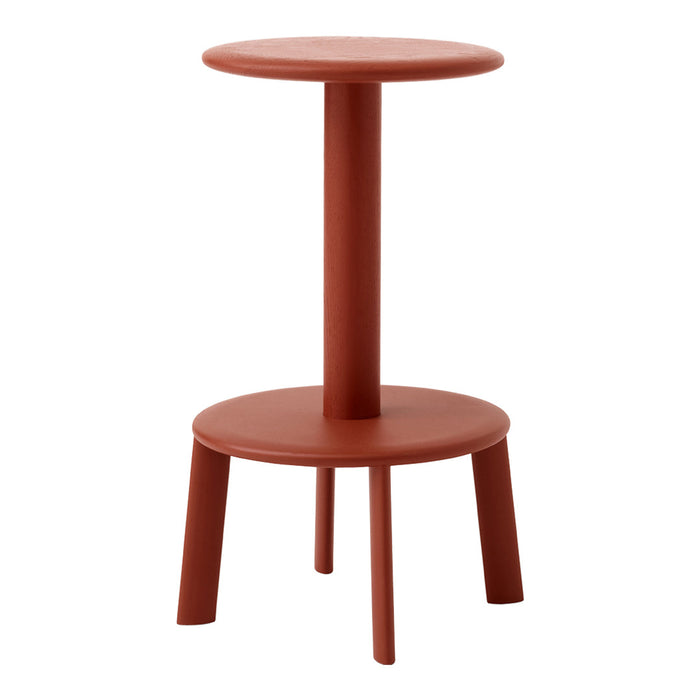 Rust-colored, minimalist side table with smooth, circular top and sturdy legs. Modern design perfect for any decor.