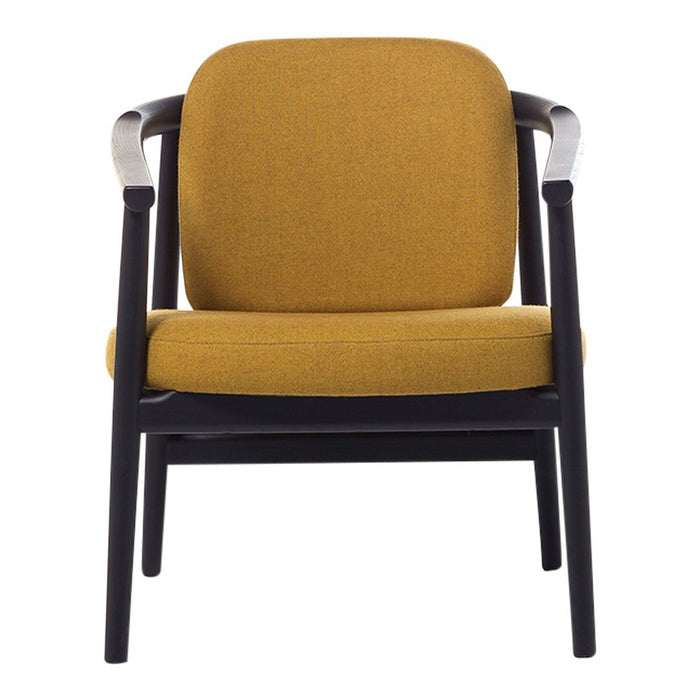 Modern accent chair in mustard yellow fabric with sleek black wooden frame. Ideal for stylish living spaces.