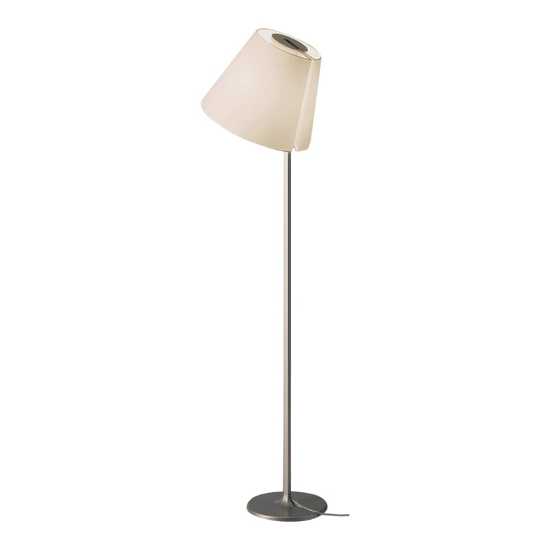 White tapered lampshade on a sleek silver metal base, modern design with minimalistic style.