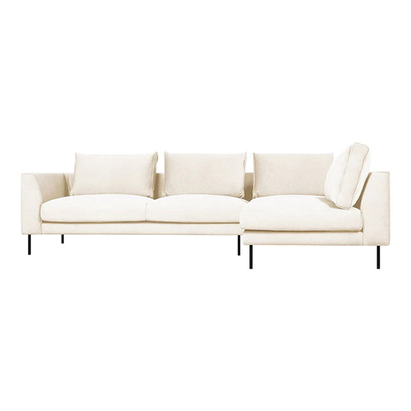 Cream-colored sofa with a sleek design and plush cushions, featuring a minimalist aesthetic and black metal legs.