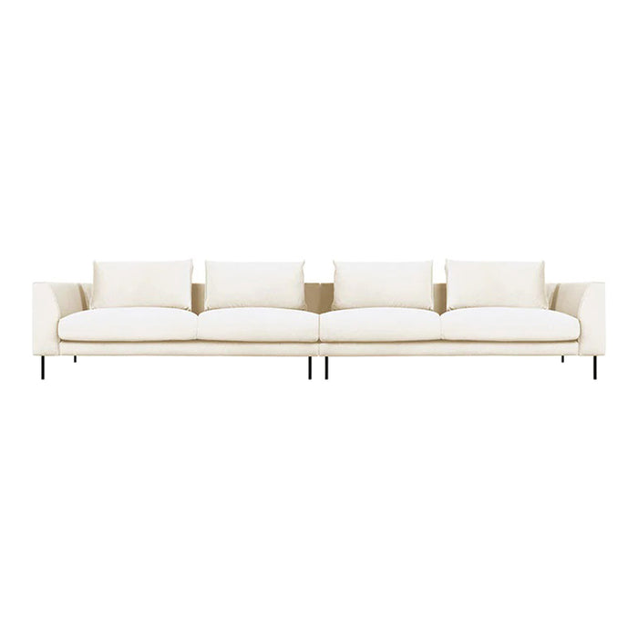 Modern cream sofa with plush cushions and sleek metal legs, perfect for contemporary interiors.