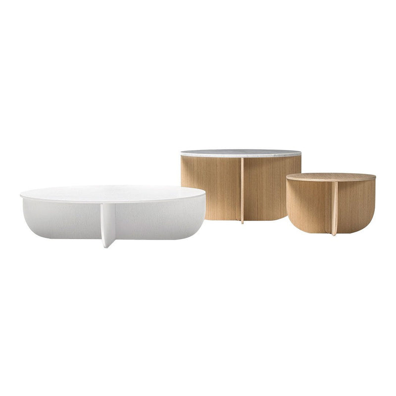 Set of three modern coffee tables featuring white and natural wood finishes with sleek, minimalist designs.